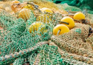 cutcaster-photo-100571470-Fishing-nets-and-buoys